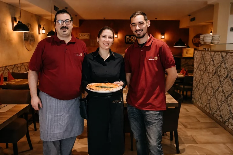 Team der Osteria Antico Il Mattone im Restaurant in Bonn